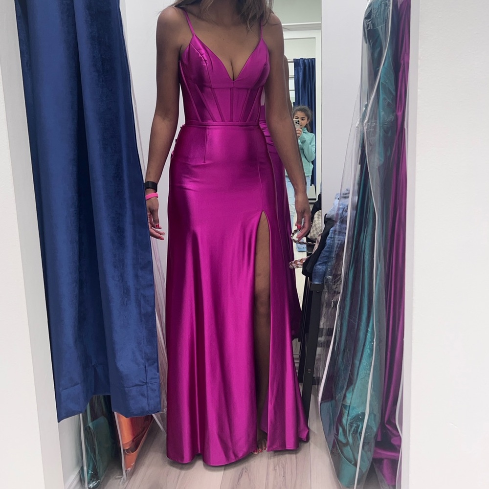 Sherri Hill Magenta Corset gown.